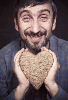 Man holding heart in his hands