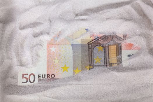 Euro Note in Sand