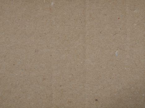Blank sheet of old brown paper useful as a background