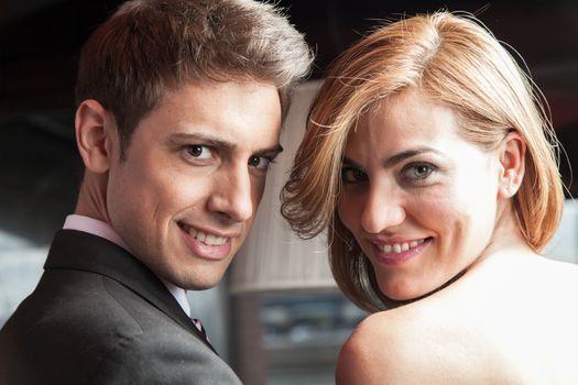 Couple looking at camera