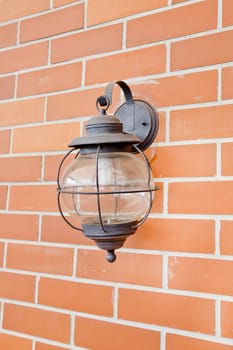 Vintage lantern on a wall.