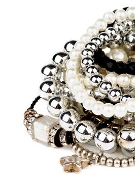 Stack of Various Pearl, Silver and Black Jewelry Gems Bracelets isolated on white background