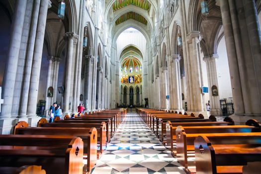 Madrid, Spain - May 6, 2012: Cathedral Almudena interior with view of the pipe organ on a sunny day in Madrid, Spain