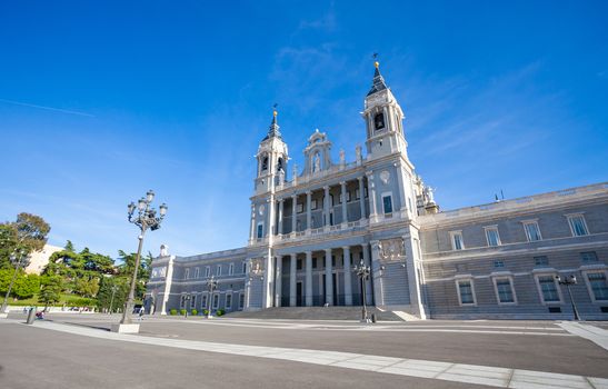 Madrid, Spain - May 6, 2012: Cathedral Almudena with tourists on a spring day in Madrid, Spain