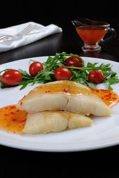 Flounder fillets (steamed) sauce with arugula and cherry tomatoes