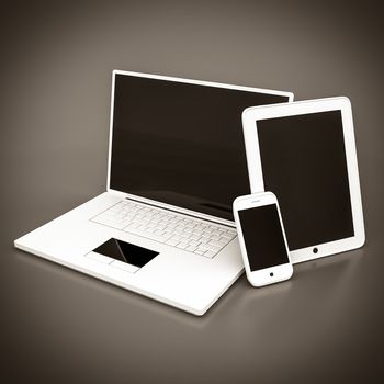 Laptop, tablet and smartphone on a gray background. black and white