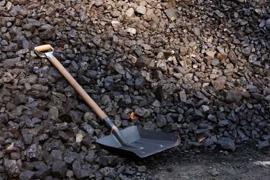 A shovel in the heap of coal