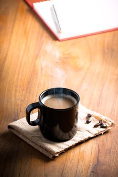 Coffee cup and coffee beans, vintage style