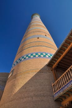 Tall minaret in town of Khiva in Uzbekistan