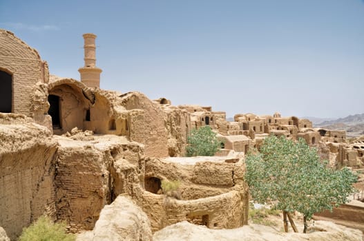 Ruins of old houses in village of Kharanaq in Iran