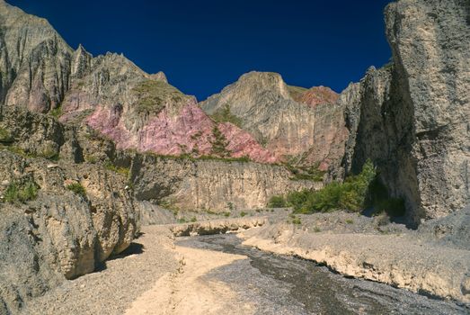 Picturesque colorful walls of canyon in valley Quebrada de Humahuaca in Argentina, Jujuy province