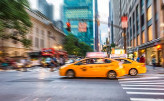 Blurred and zoomed traffic view in New York City.