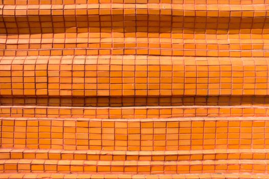 Orange tiled wall for background