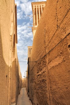 Empty narrow street in the city of Yazd in Iran