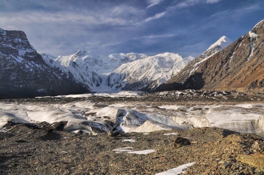 Scenic Engilchek glacier with picturesque Tian Shan mountain range in Kyrgyzstan