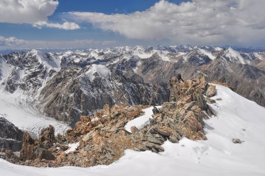 Breathtaking view of mountain peaks and glaciers in Tian Shan mountain range in Kyrgyzstan