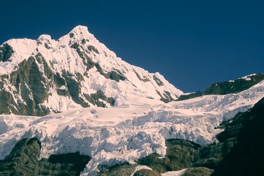 Majestic peak covered by snow in Peruvian Andes, Cordillera Blanca