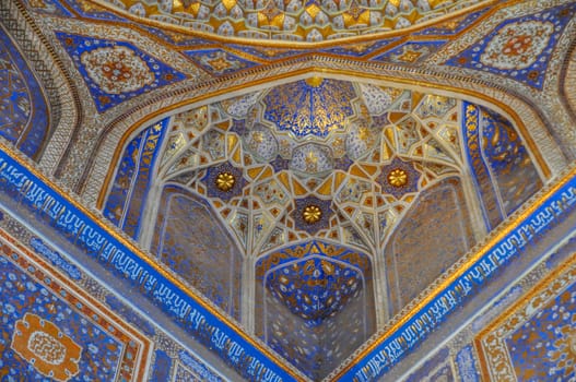 Beautiful artwork on ceiling in mosque in Samarkand, Uzbekistan