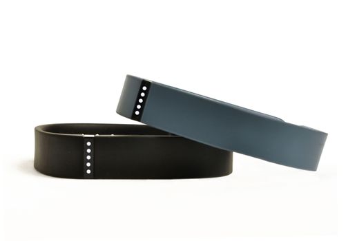 Activity fitness trackers on a white background