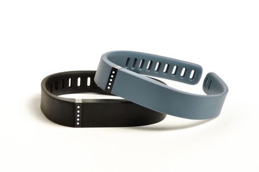 Activity fitness trackers on a white background