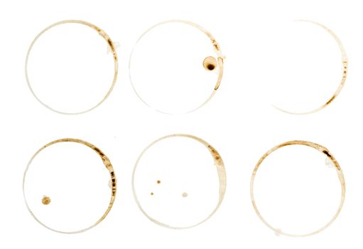 Lot of circle shape coffee stains on white background.