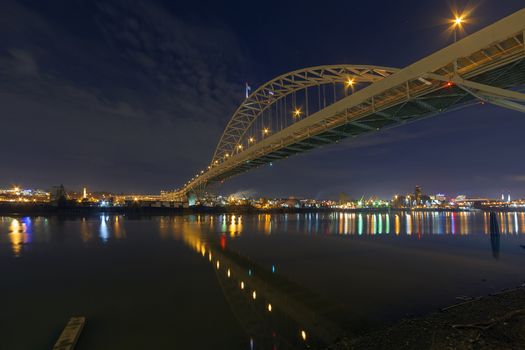 Fremont Bridge Over Willamette River in Portland Oregon Industrial Area at Night