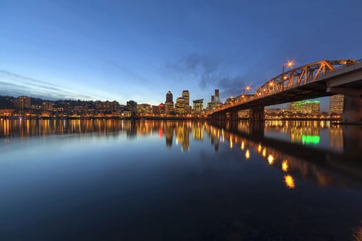 Portland Oregon Downtown City Skyline Along Willamette River by the Hawthorne Bridge at Evening Blue Hour