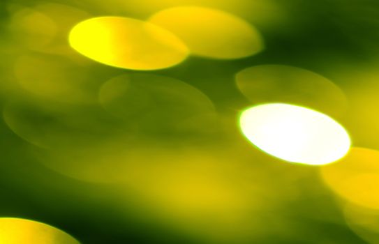 Green yellow circle shape lights as christmas background.