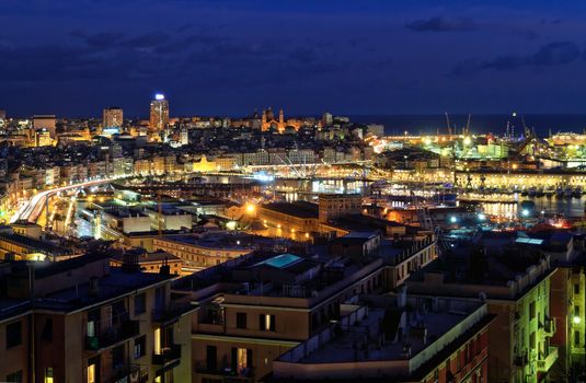 night scene with the port of Genoa, Liguria, Italy