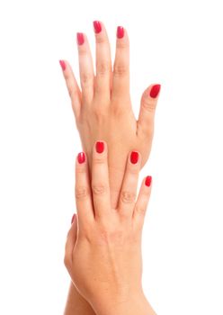 Beautiful manicured hands on a white background