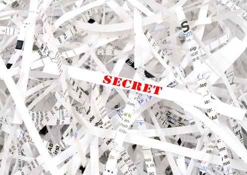 Secret text surrounded by shredded paper. Great concept for information protection