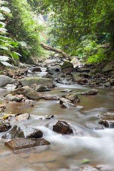 Waterfall that flows down from the mountains. Streams of water flowing down from the mountains. There is always a small stone waterfall.