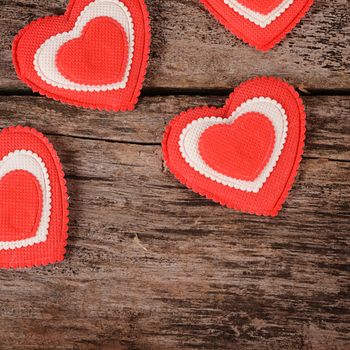 The hearts on wooden background. Valentine's day