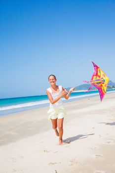 Beach cute girl kite flying outdoor coast ocean