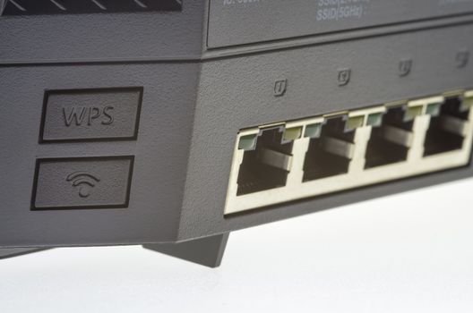 Internet gateway ports and button, close up image