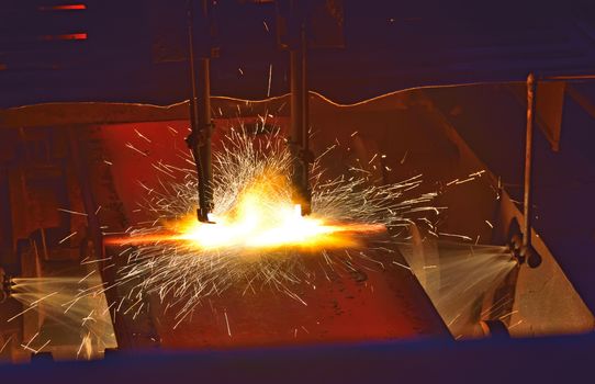 Gas cutting of the hot metal