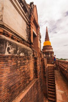 AYUTTHAYA,THAILAND-JUNE 2013: Walking around Watyaichaimongkol,tourist always look down to see city plan of Ayutthaya.