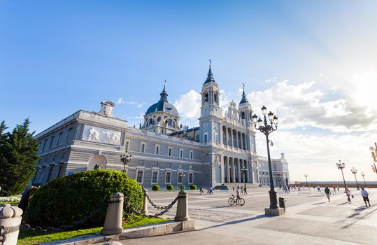 Madrid, Spain - May 6, 2012: Cathedral Almudena with tourists on a spring day in Madrid, Spain