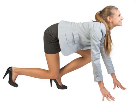 Businesswoman standing in running start pose, smiling, side view. Isolated over white background