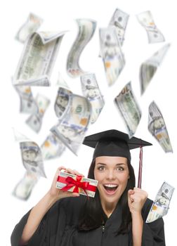 Excited Female Graduate in Cap and Gown Holding Stack of $100 Bills with Many Falling Around Her on White.