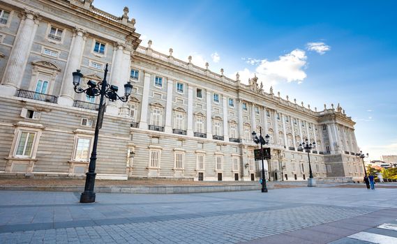 Madrid, Spain - May 6, 2012: Royal palace (Palacio Real de Madrid) with tourists on spring day in Madrid, Spain