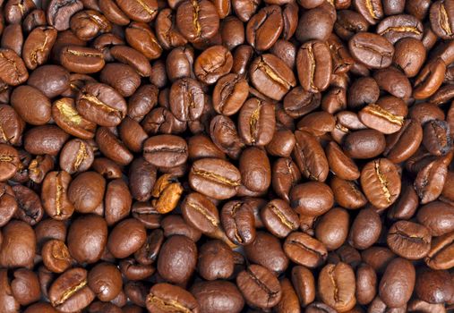 Dark coffee beans textured background