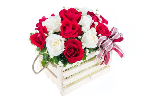 Red and white rose in a wooden basket with beautiful ribbon, gift for valentine 's day, isolated on white background