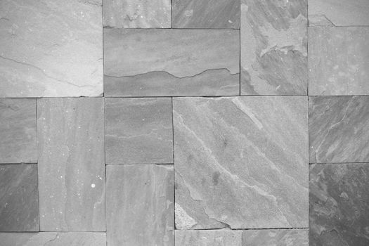 Natural slate tile paving in the sape of rectangle, black and white