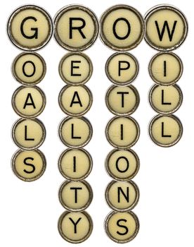 grow crossword - goals, reality, options and will - in old round typewriter keys isolated on white