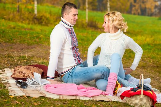 young couple in love autumn day at the picnic