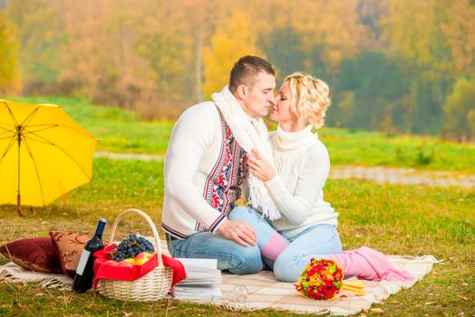 young people spend time on a romantic picnic