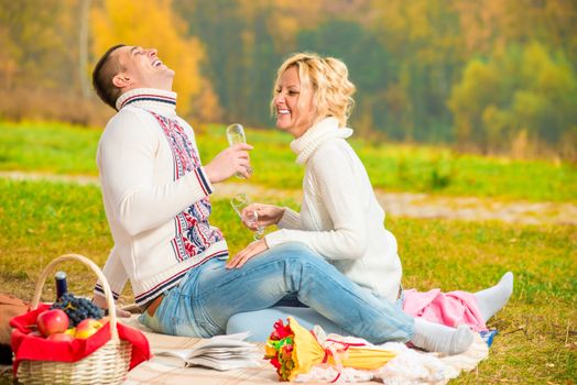 happy couple relaxing weekend on a picnic