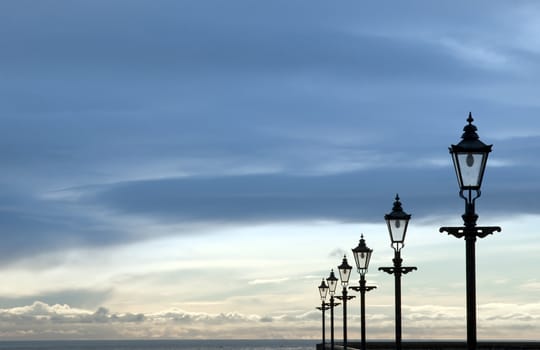 row of vintage lamps on the promenade in Youghal county Cork Ireland