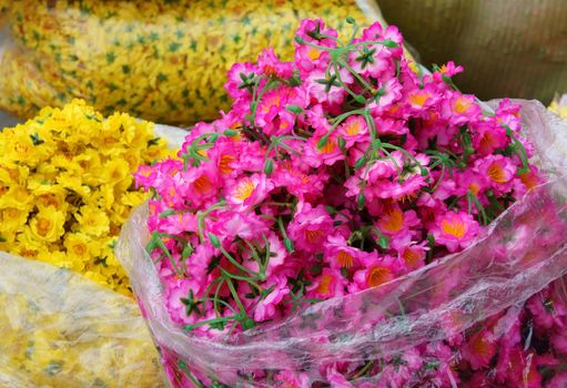 Colourful raw materiral decoration to decorate for house on New Year seasonal at Vietnam, Vietnamese like sakura blossom on Tet and use artificial flower to make beautiful for tree